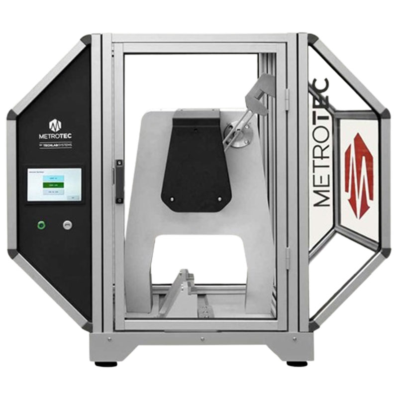 Front view of the METROTEC pendulum impact testing machine with a glass door and integrated touchscreen interface.