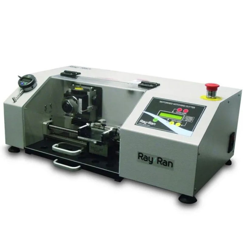 A Ray-Ran Motorised Notching Cutter with a digital control panel, protective enclosure, and precision cutting mechanism for preparing test specimens.